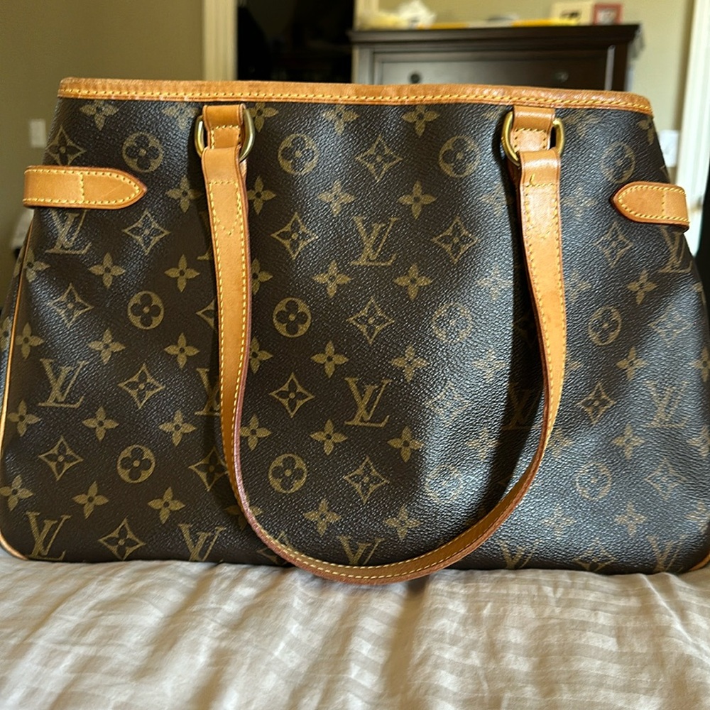This is a vintage Louis Vuitton monogram tote